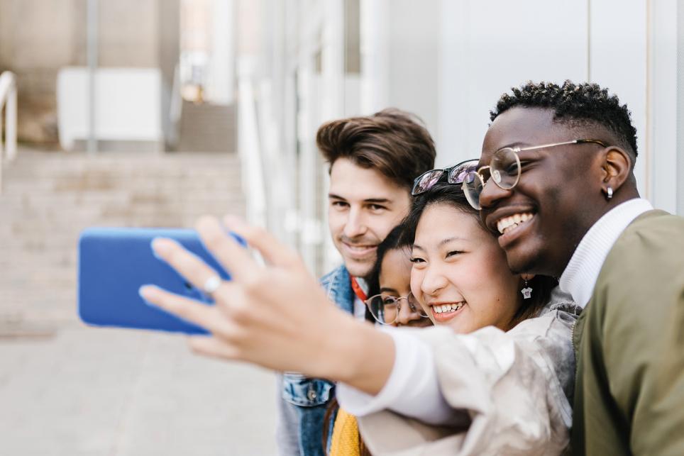 kids taking selfie with cellphone