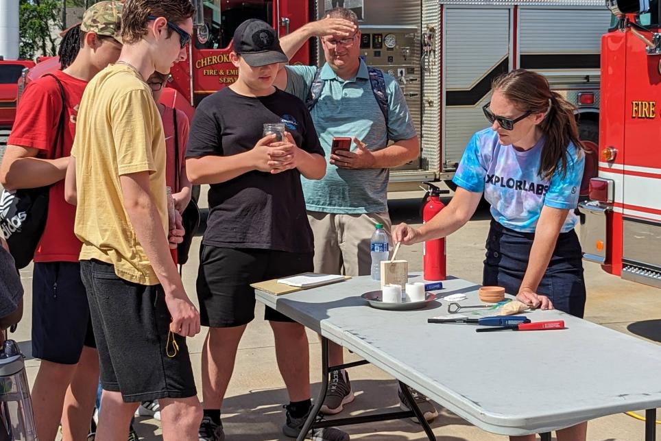 Students participate in burn demonstrations and hands-on activities through a partnership with Xplorlabs and Cherokee County, Georgia.